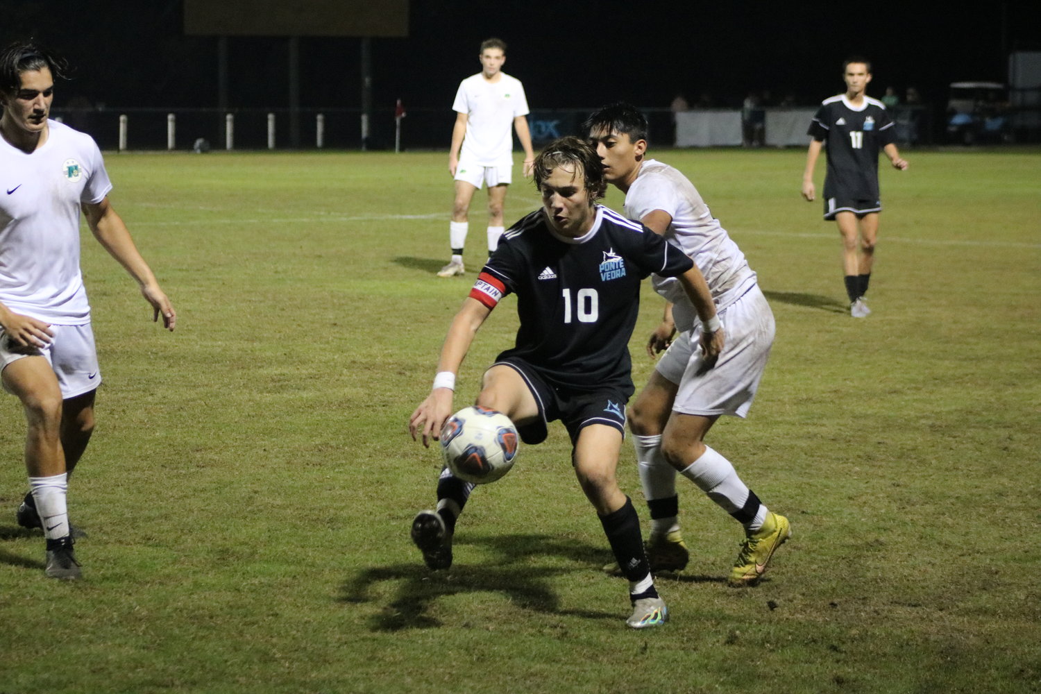 Mark Romano of Ponte Vedra controls the ball along the sideline against Nease.